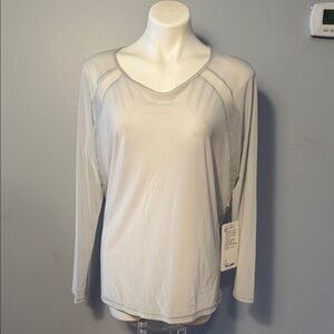 Lululemon ladies If Youre Lucky Long Sleeve Tee II in Silver Spoon. NWT. Size 10